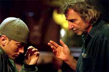 Eminem and director Curtis Hanson on the set of Universal's 8 Mile - 2002